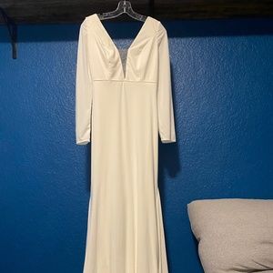 Unworn modern wedding gown long sleeves
